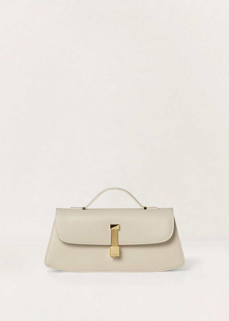 Kassandre Colonne clutch in off-white cow leather with gold hardware, rigorous lines, front view