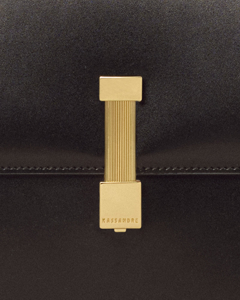 Kassandre Colonne hobo bag in black cow leather with gold hardware, column volume, detail view