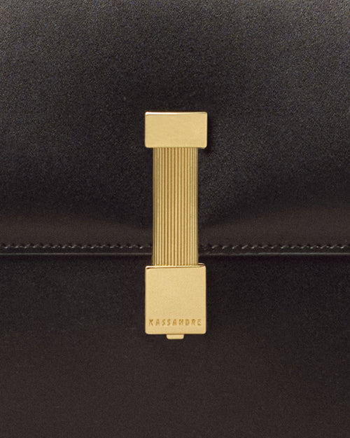 Kassandre Colonne hobo bag in black cow leather with gold hardware, column volume, detail view