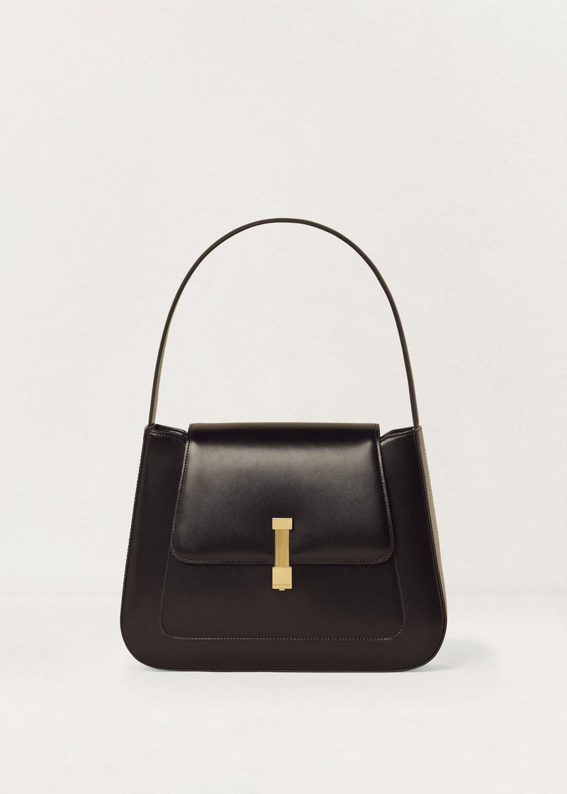 Kassandre Colonne hobo bag in black cow leather with gold hardware, column volume, front view