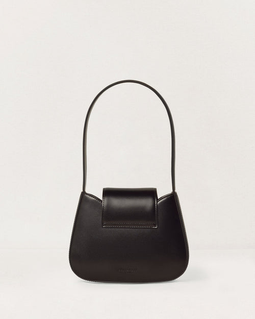 Kassandre Colonne mini hobo bag in black cow leather, column-like volume, back view