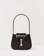 Kassandre Colonne mini hobo bag in black cow leather, column-like volume, front view
