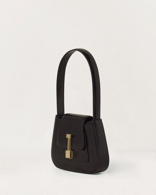 Kassandre Colonne mini hobo bag in black cow leather, column-like volume, three quarter view