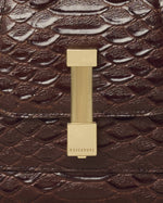 Kassandre Colonne mini hobo bag in brown python-effect leather, column volume, detail view 