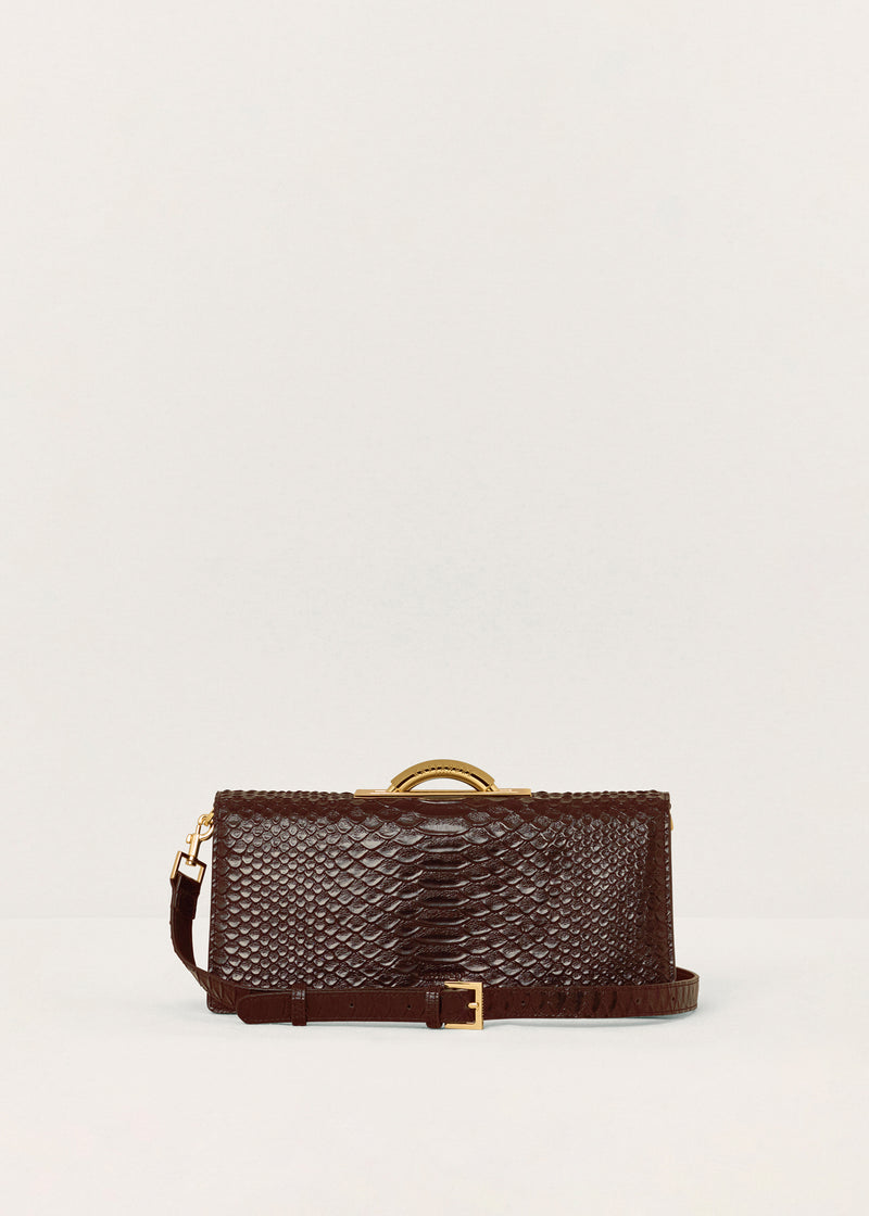 Kassandre Deva clutch in brown python-effect leather, sculptural Art Deco geometry, removable strap , crossbody bag ,front view