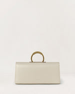 Kassandre Deva clutch in off-white cow leather, pure geometric form, adjustable strap, removable strap , crossbody bag ,front view
