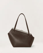 Kassandre Eileen asymmetric shoulder bag in brown cow leather, silver frame, graphic geometry, back view