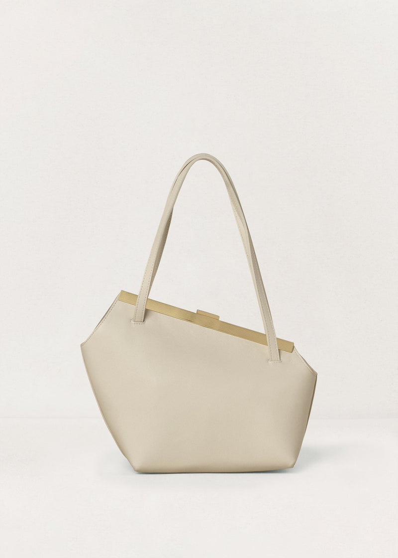 Kassandre Eileen asymmetric shoulder bag in off-white cow leather, clean line, gold frame, back view