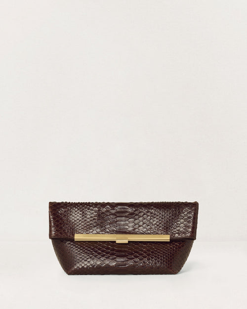 Kassandre Eileen clutch in brown python-effect leather with striped metal frame, front view