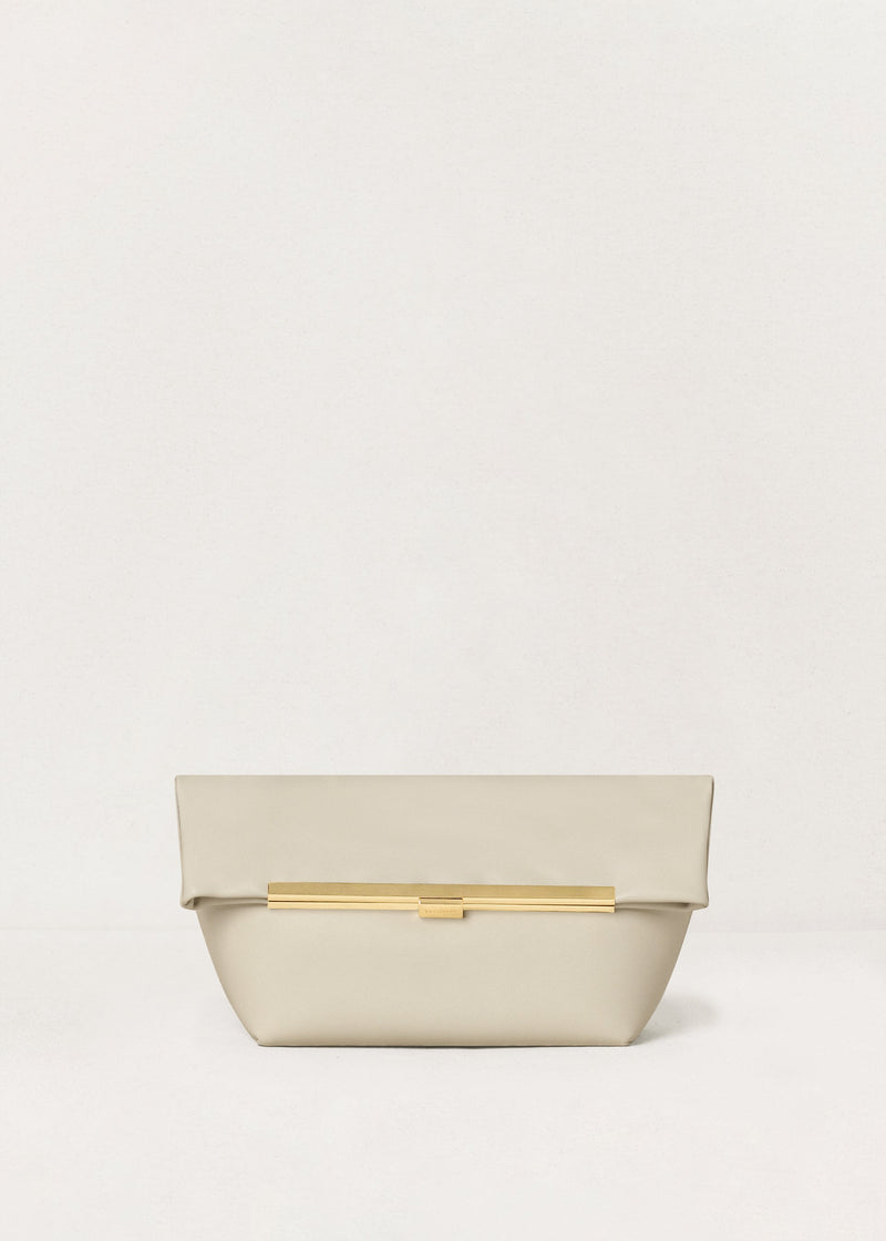 Kassandre Eileen clutch in off-white cow leather with gold metal frame, Art Deco lines, front view