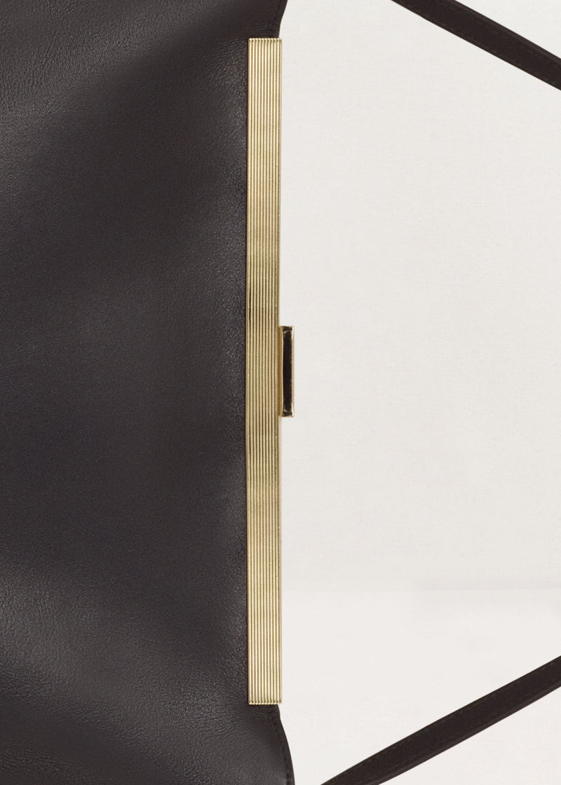 Kassandre Eileen computer bag in black cow leather with gold striped metal frame, detail view