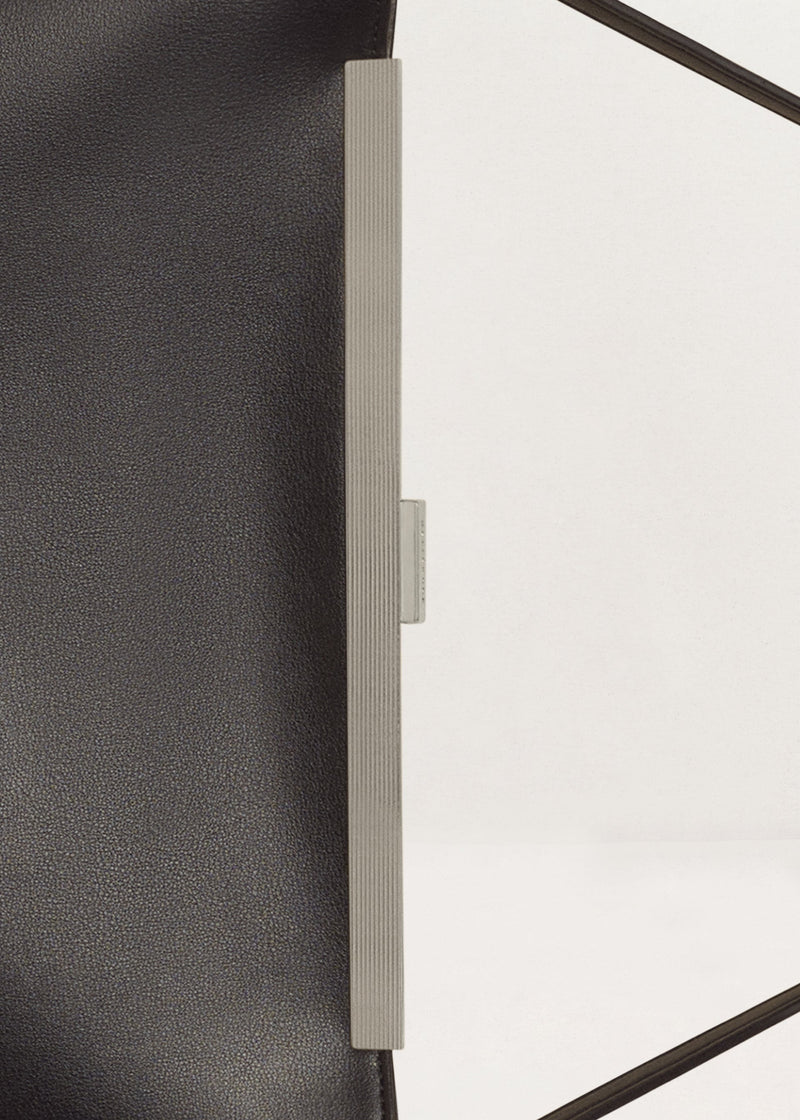 Kassandre Eileen computer bag in black cow leather with silver striped metal frame detail view