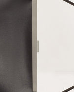 Kassandre Eileen computer bag in black cow leather with silver striped metal frame detail view