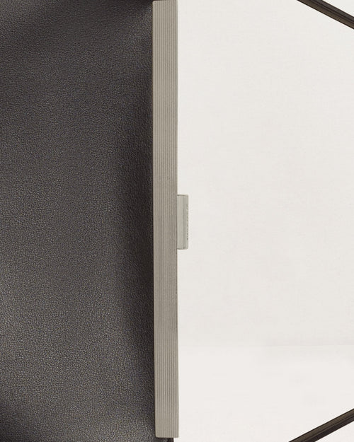 Kassandre Eileen computer bag in black cow leather with silver striped metal frame detail view