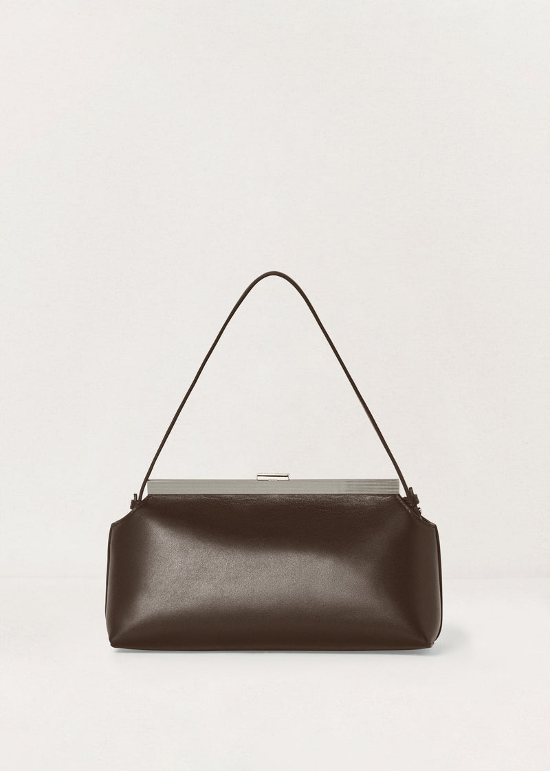 Kassandre Eileen shoulder bag in brown smooth cow leather with striped metal frame, back view